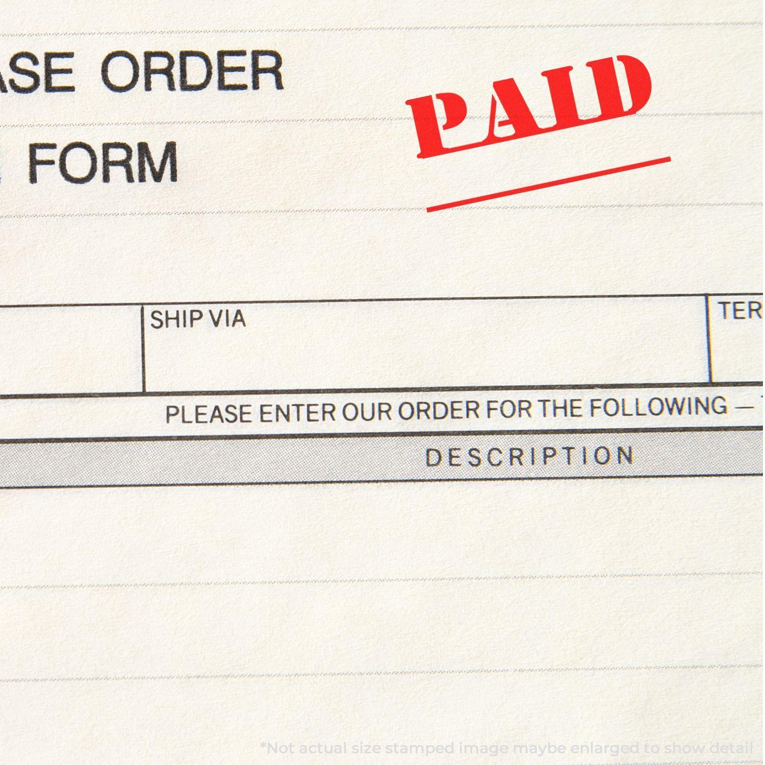 Purchase order form stamped with a red 'PAID' and date line rubber stamp, indicating payment has been made.