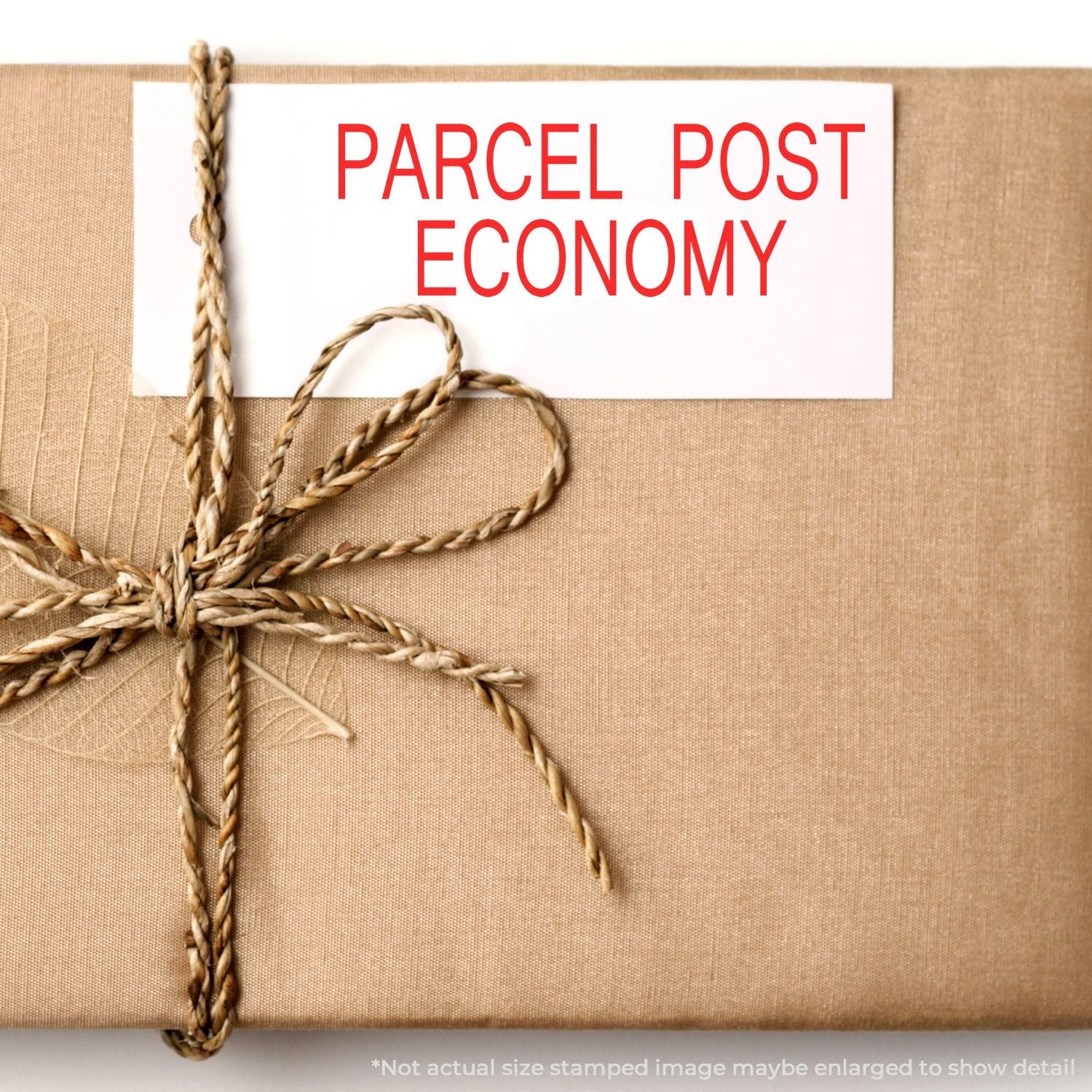 A self-inking stamp with a stamped image showing how the text "PARCEL POST ECONOMY" is displayed after stamping.