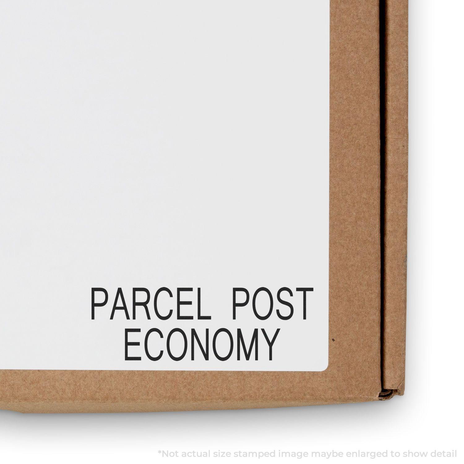 Large Pre-Inked Parcel Post Economy Stamp used on a cardboard box, showing clear and bold text PARCEL POST ECONOMY on a white label.