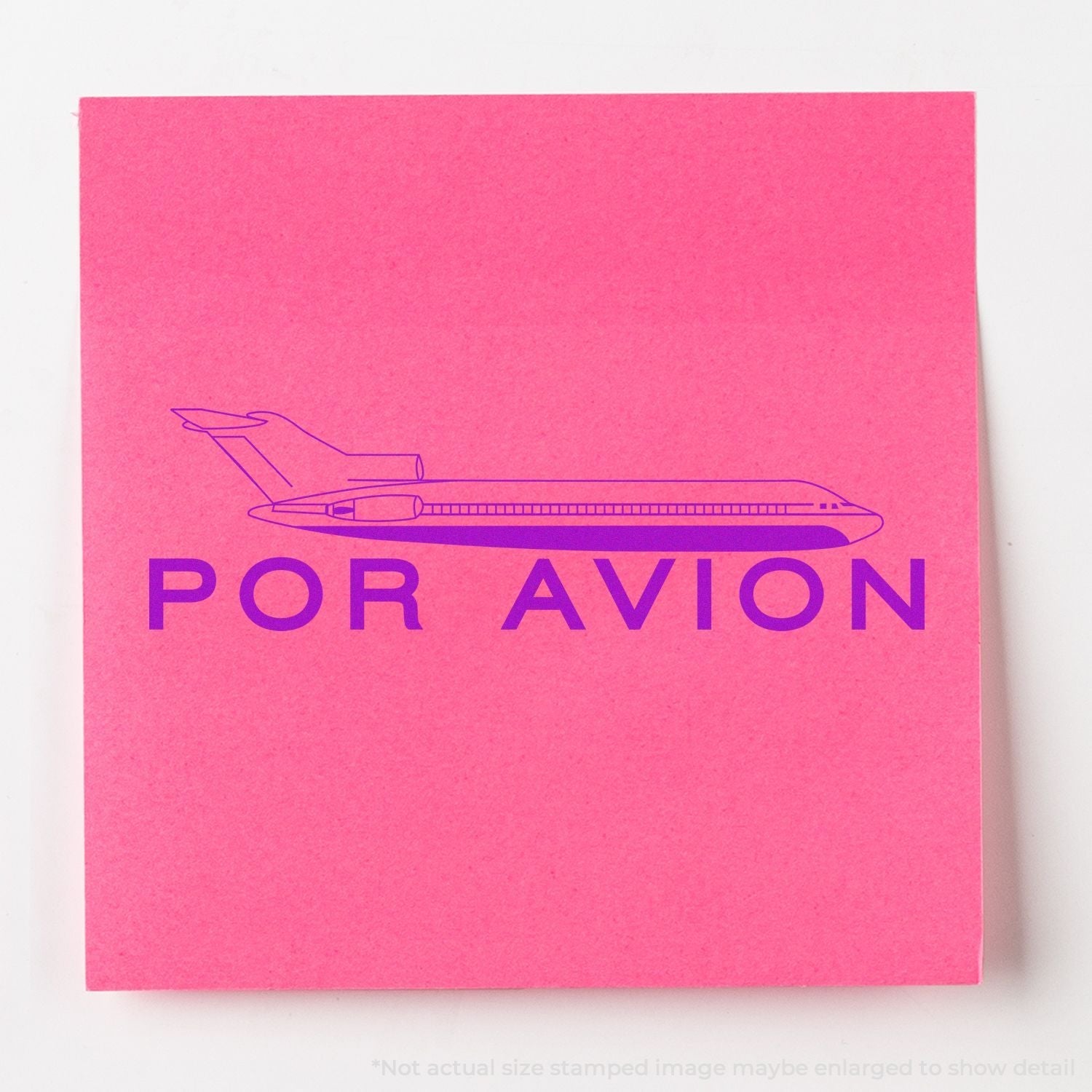 A self-inking stamp with a stamped image showing how the text "POR AVION" with an icon of an airplane above the text is displayed after stamping.