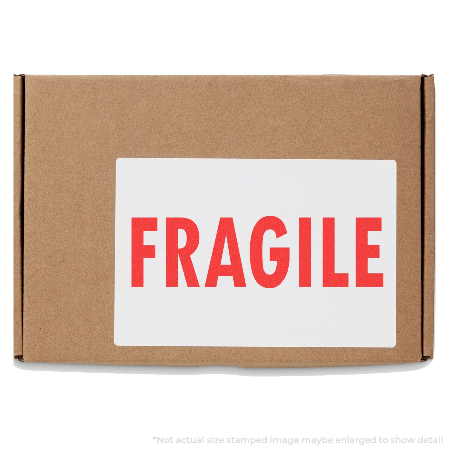 Self Inking Fragile Stamp used on a brown cardboard box, displaying a bold red FRAGILE label.