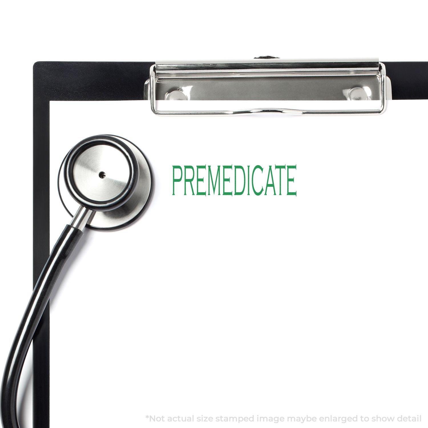 Clipboard with PREMEDICATE stamped in green using the Large Pre-Inked Premedicate Stamp, with a stethoscope beside it.