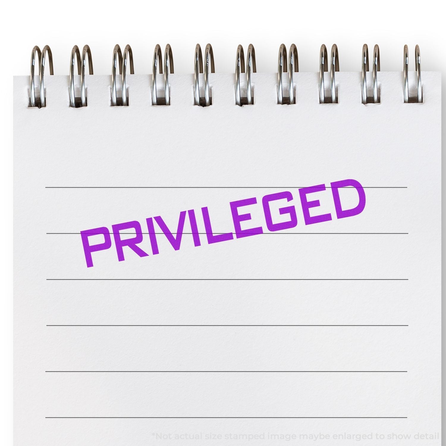 Self Inking Privileged Stamp marking PRIVILEGED in purple ink on a white spiral notebook with lined paper.