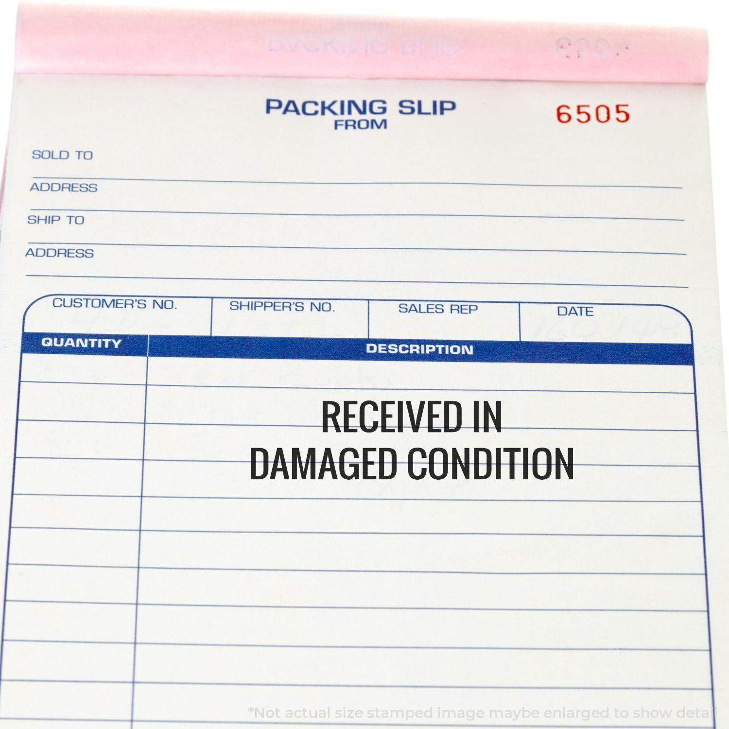 Packing slip with RECEIVED IN DAMAGED CONDITION stamped using the Large Received in Damaged Condition Rubber Stamp.