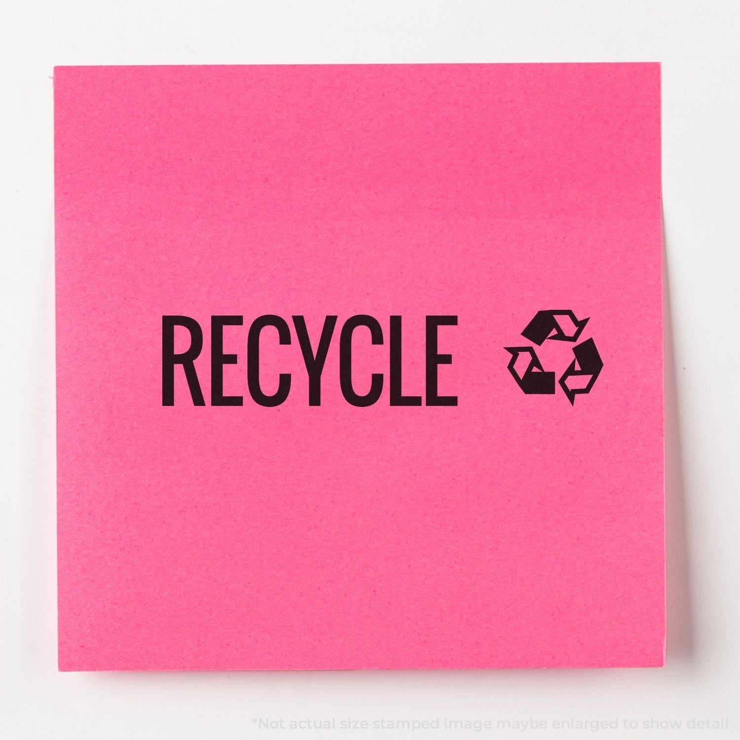 A self-inking stamp with a stamped image showing how the text "RECYCLE" with the recycling icon on the right side is displayed after stamping.