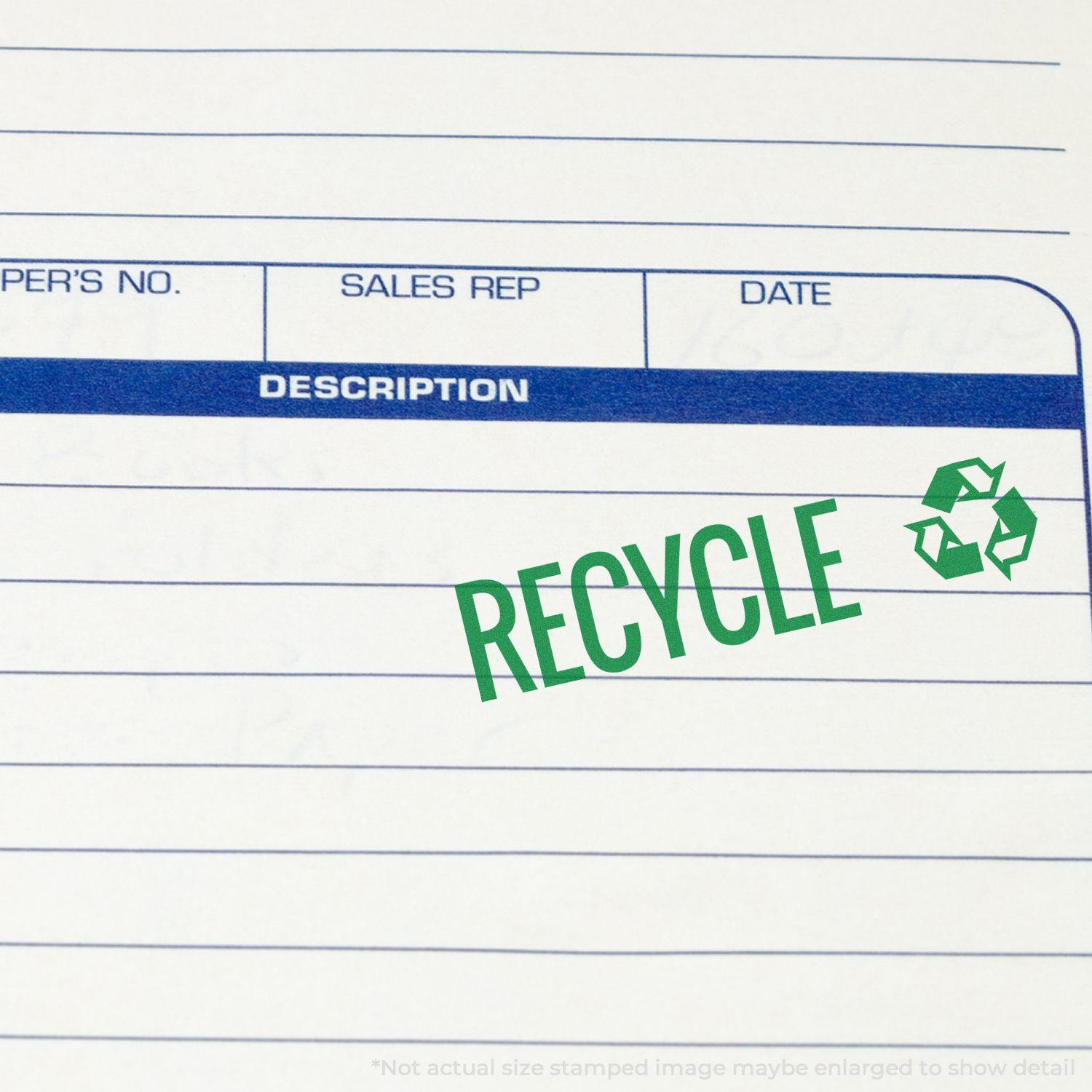 Large Pre-Inked Recycle with Logo Stamp marking a green 'RECYCLE' and recycling symbol on a white form with blue lines.