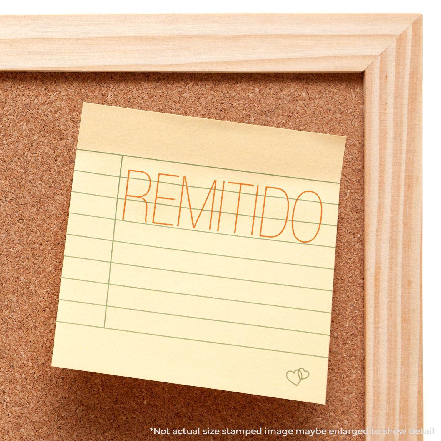 A corkboard with a sticky note stamped REMITIDO using the Large Pre-Inked Remitido Stamp. The note is pinned to the board.