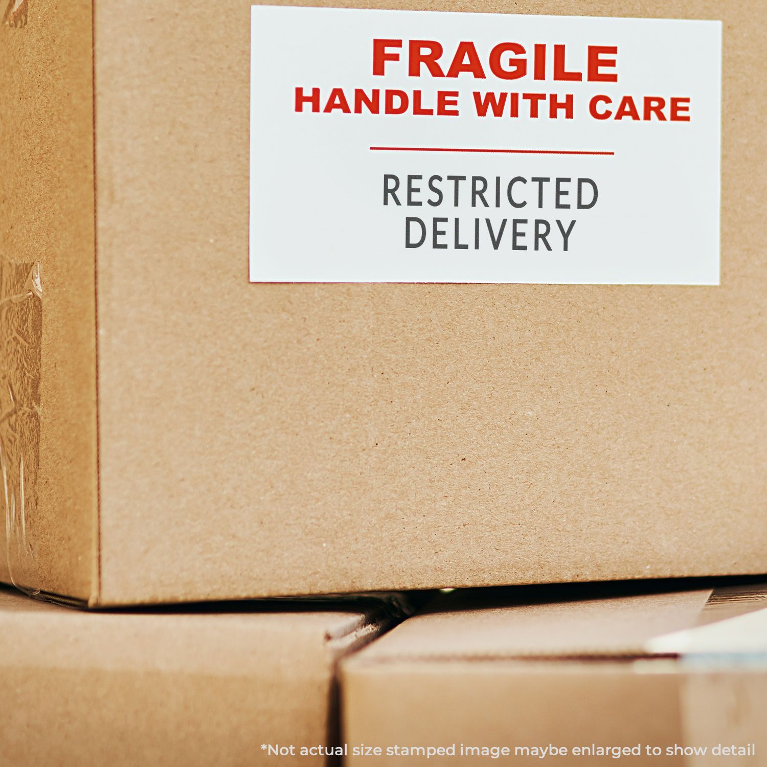 Cardboard box with a FRAGILE HANDLE WITH CARE RESTRICTED DELIVERY label stamped using the Self Inking Restricted Delivery Stamp.