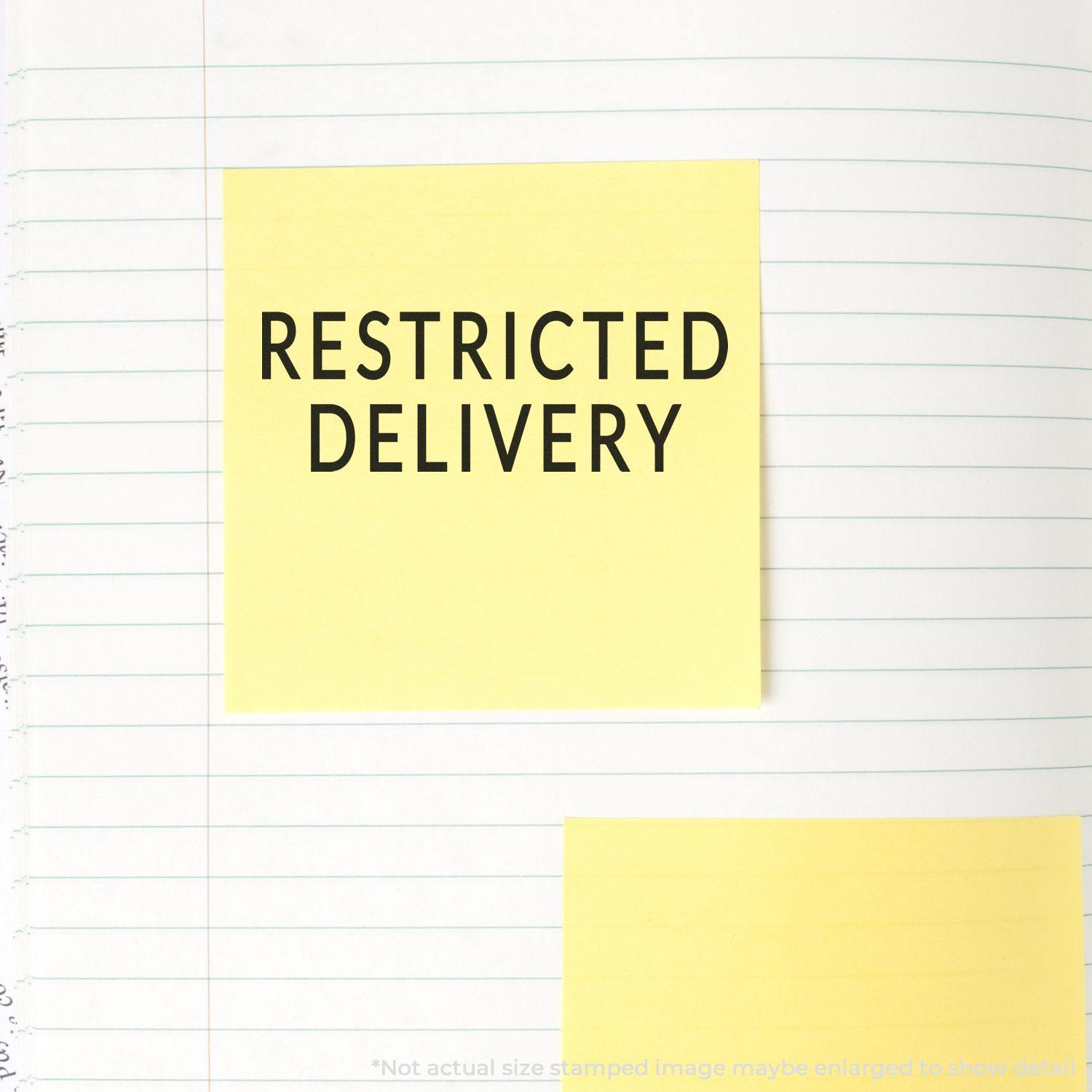 Large Pre-Inked Restricted Delivery Stamp used on a yellow sticky note placed on a lined notebook page.