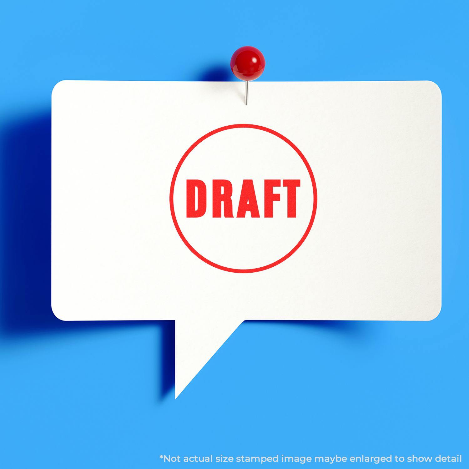 Round Draft Rubber Stamp in red ink on a white speech bubble pinned to a blue background.