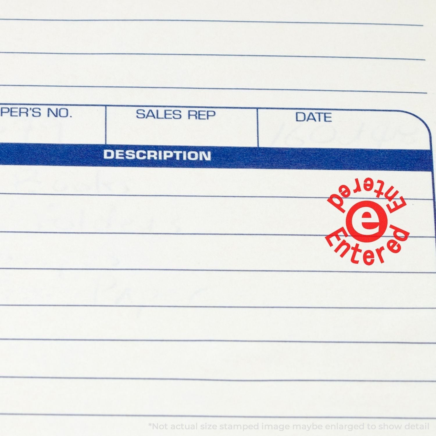 Self Inking Round Entered Entered Stamp marking a document in red ink on a lined form with sections for description, sales rep, and date.