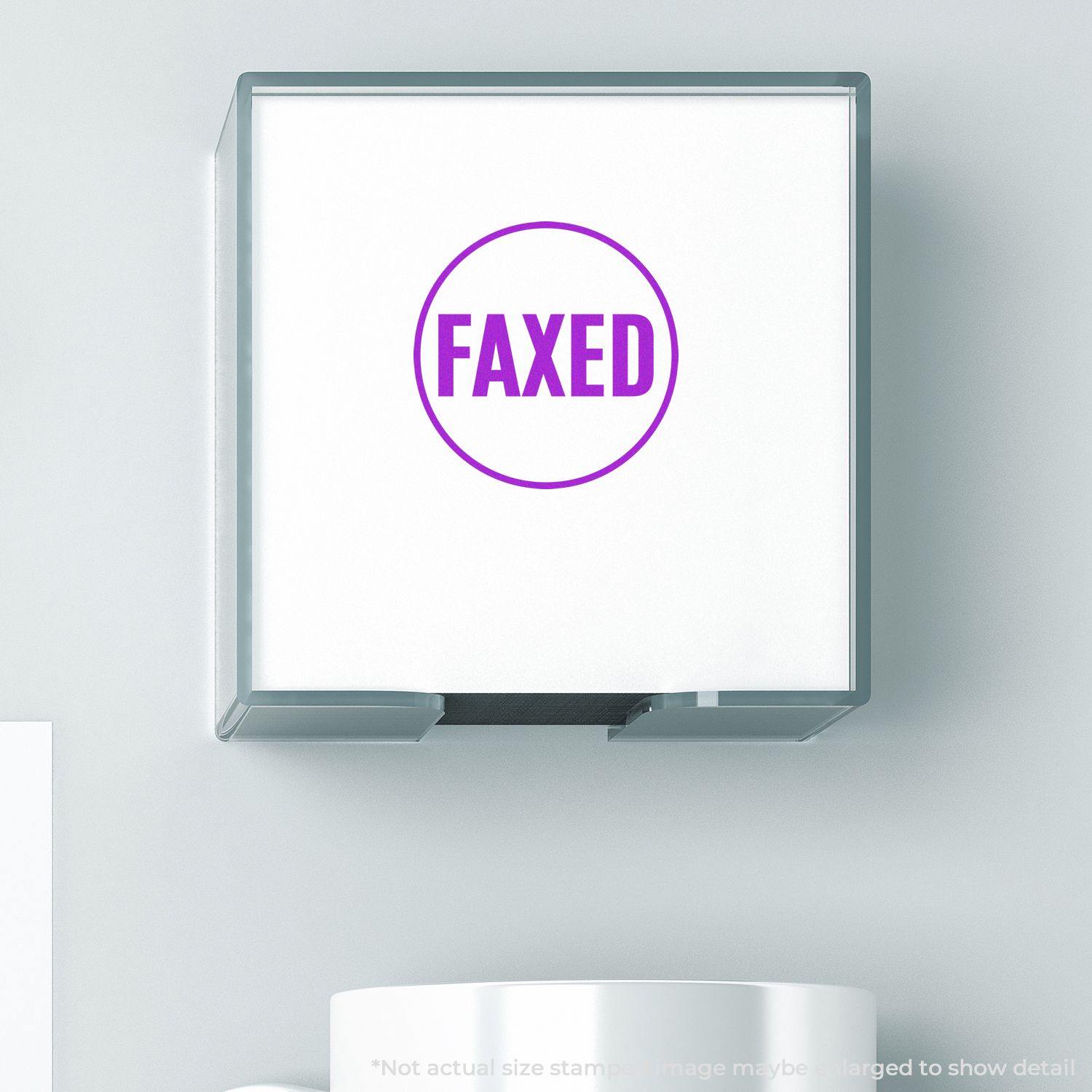 Round Faxed Rubber Stamp in purple ink on white paper, displayed in a clear plastic holder against a light gray background.