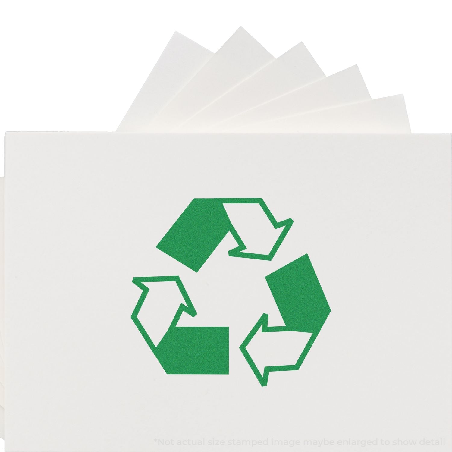 Self Inking Round Recycle Stamp in use, showing a green recycling symbol stamped on white paper.