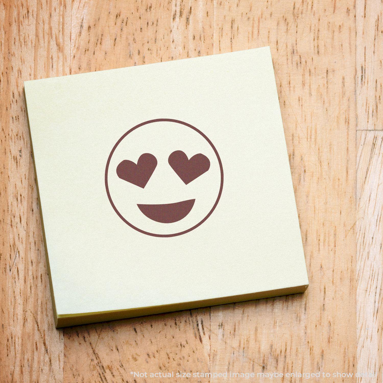 Round Smiley with Hearts Rubber Stamp on a yellow sticky note, featuring a smiley face with heart-shaped eyes.