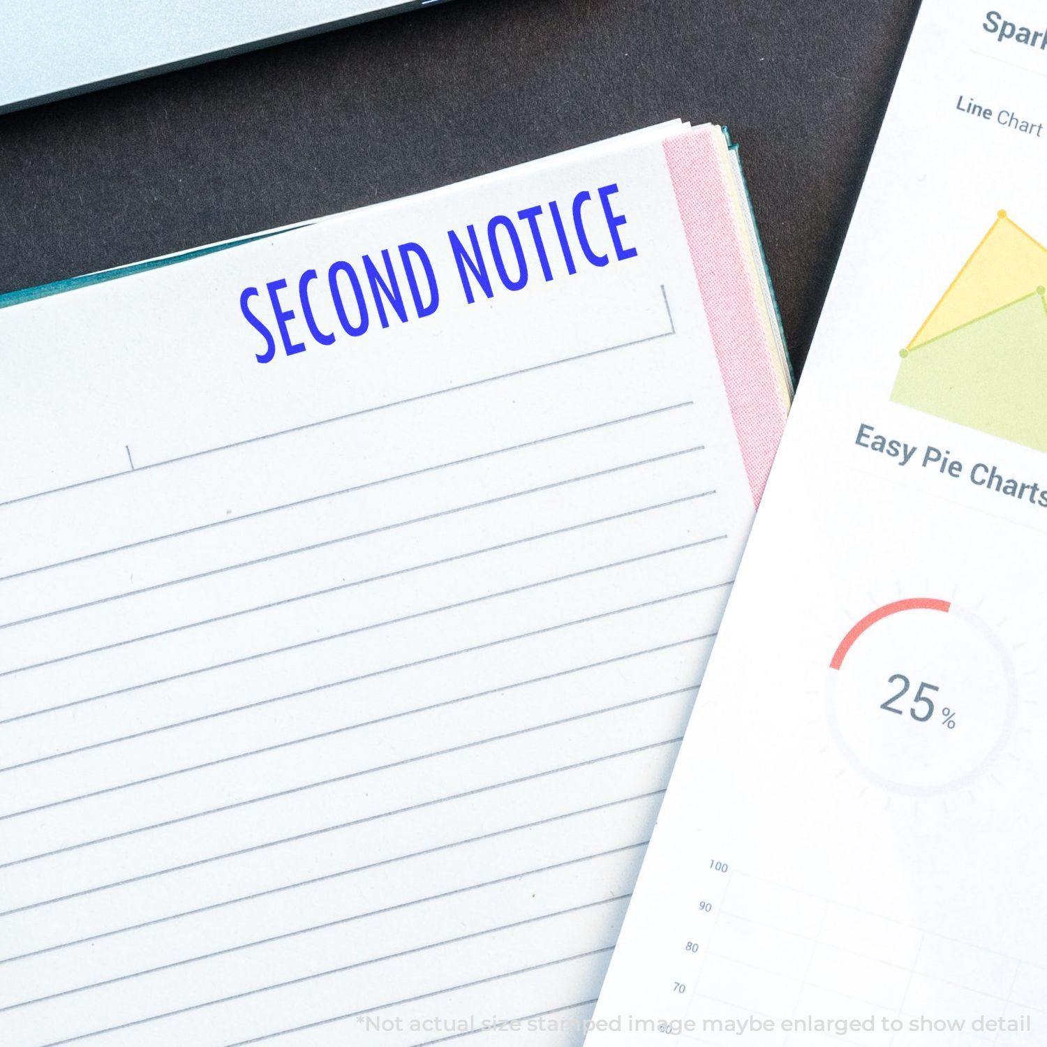 Self Inking Second Notice Stamp used on a lined paper, next to a pie chart document showing 25%.