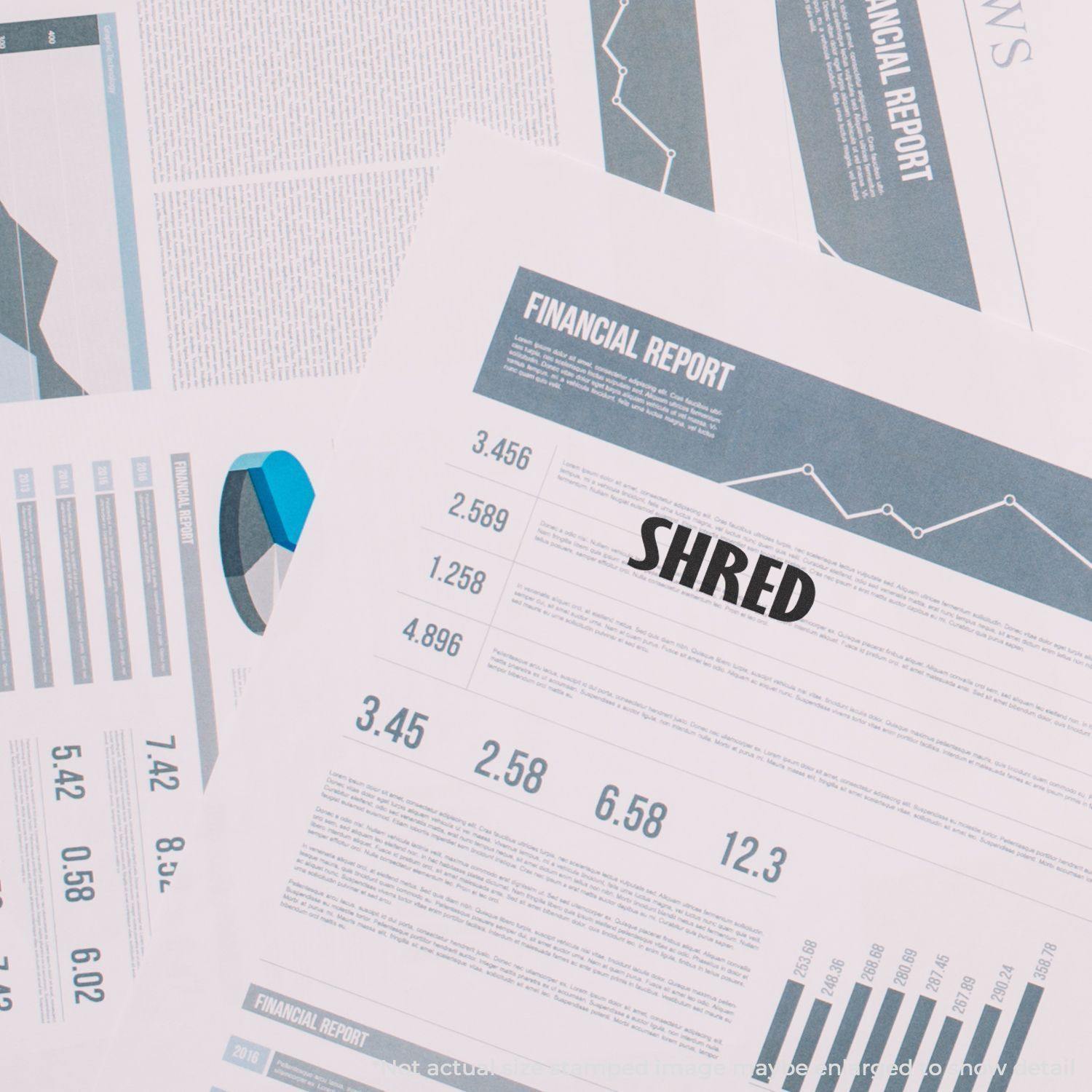 Financial reports stamped with SHRED using the Large Pre-Inked Shred Stamp, indicating documents are ready for disposal.