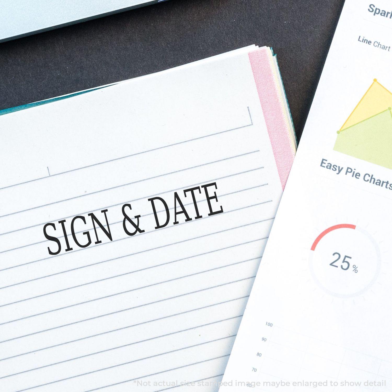 Sign & Date rubber stamp impression on a lined paper next to a chart with a 25% pie graph.