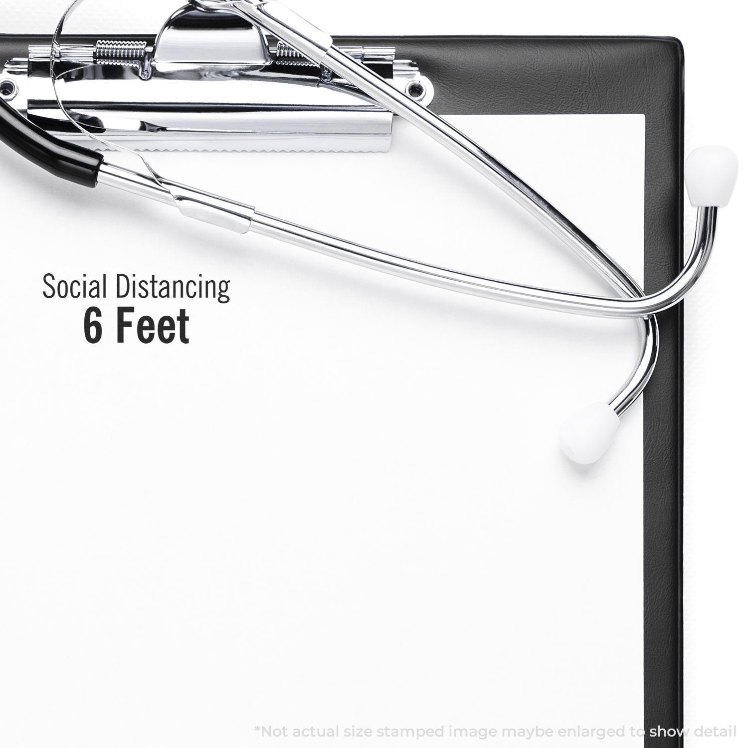 Self Inking Social Distancing 6 Feet Stamp on a clipboard with a stethoscope, emphasizing the importance of maintaining social distance.