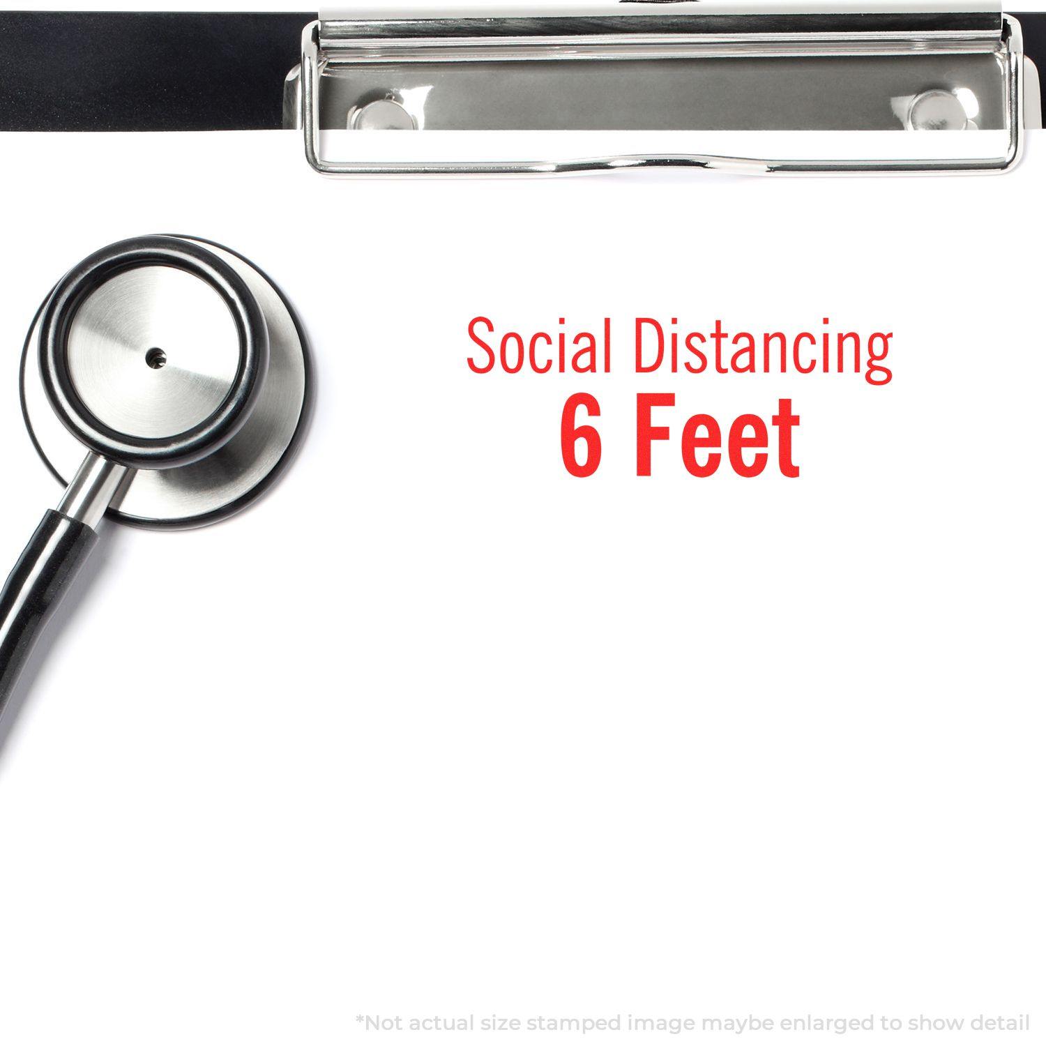 Clipboard with stethoscope and Large Pre-Inked Social Distancing 6 Feet Stamp text in red, emphasizing social distancing guidelines.