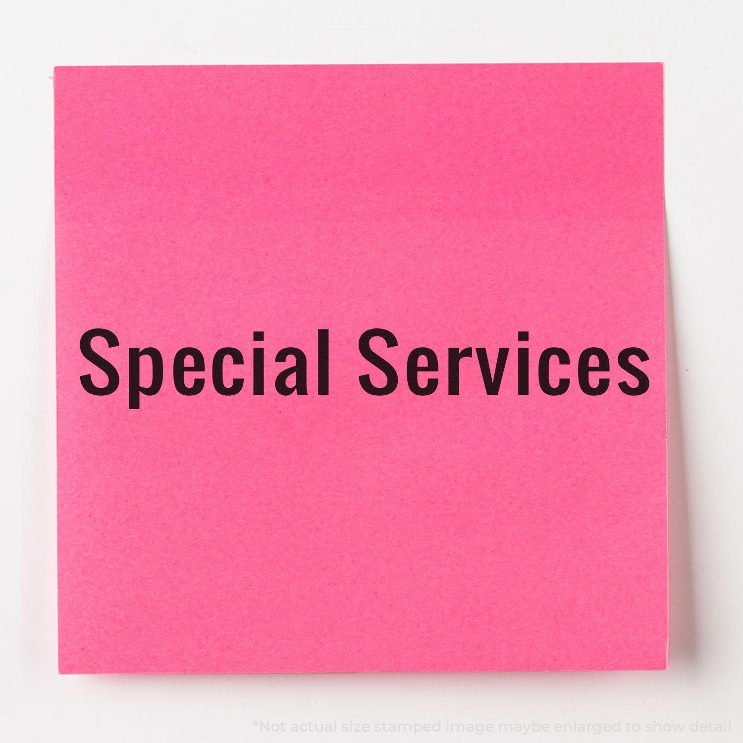 Large Pre-Inked Special Services Stamp used on a pink sticky note with the text Special Services in bold black letters.