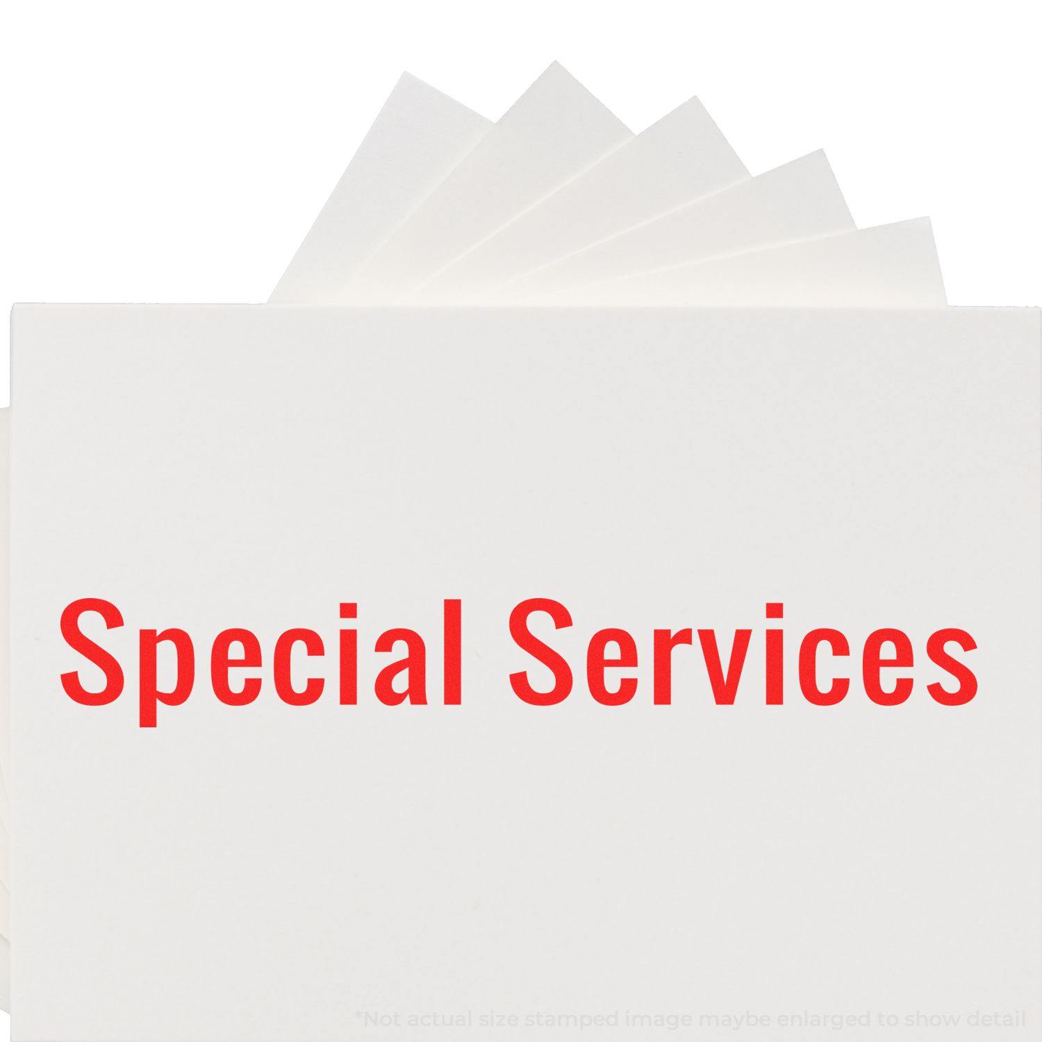 Large Special Services Rubber Stamp imprint in red on a white background with multiple sheets fanned out behind it.