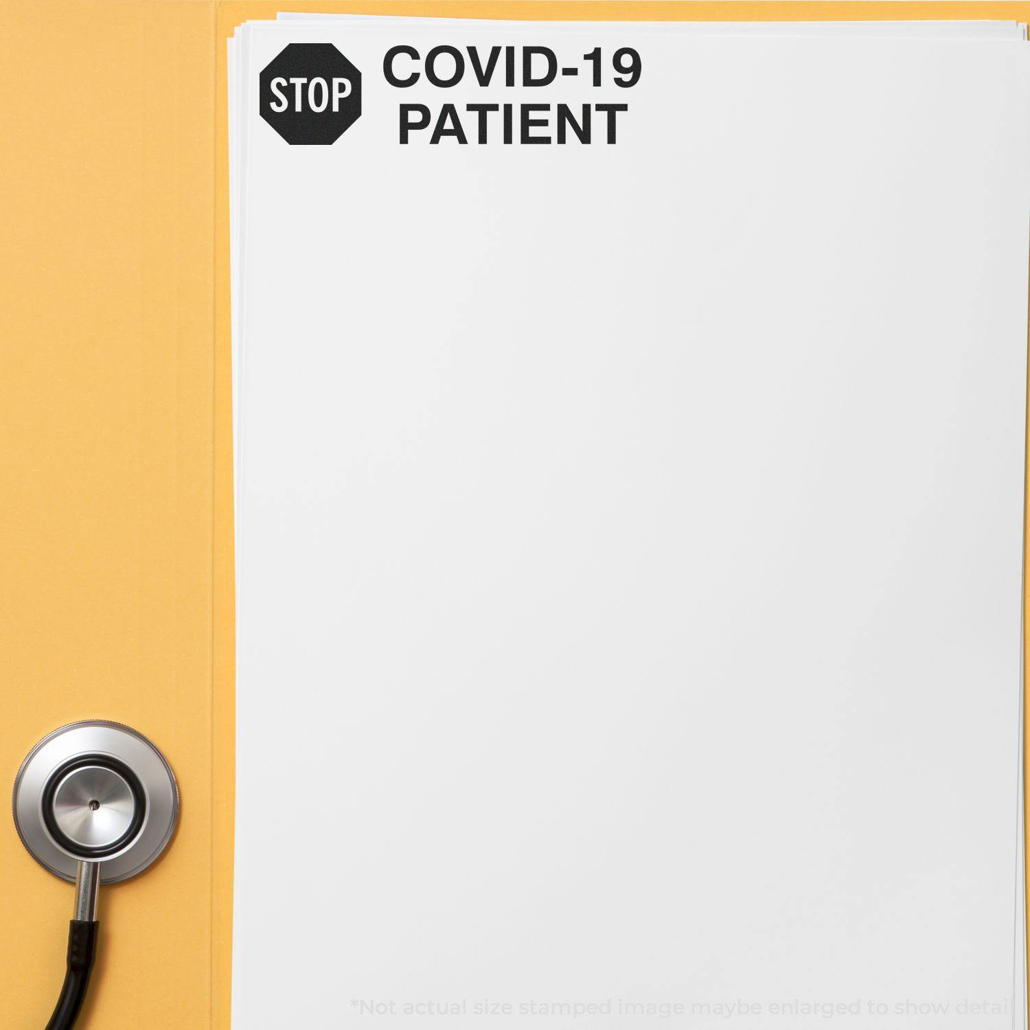 Large Stop Covid-19 Patient Rubber Stamp on a white paper with a stethoscope on a yellow background.