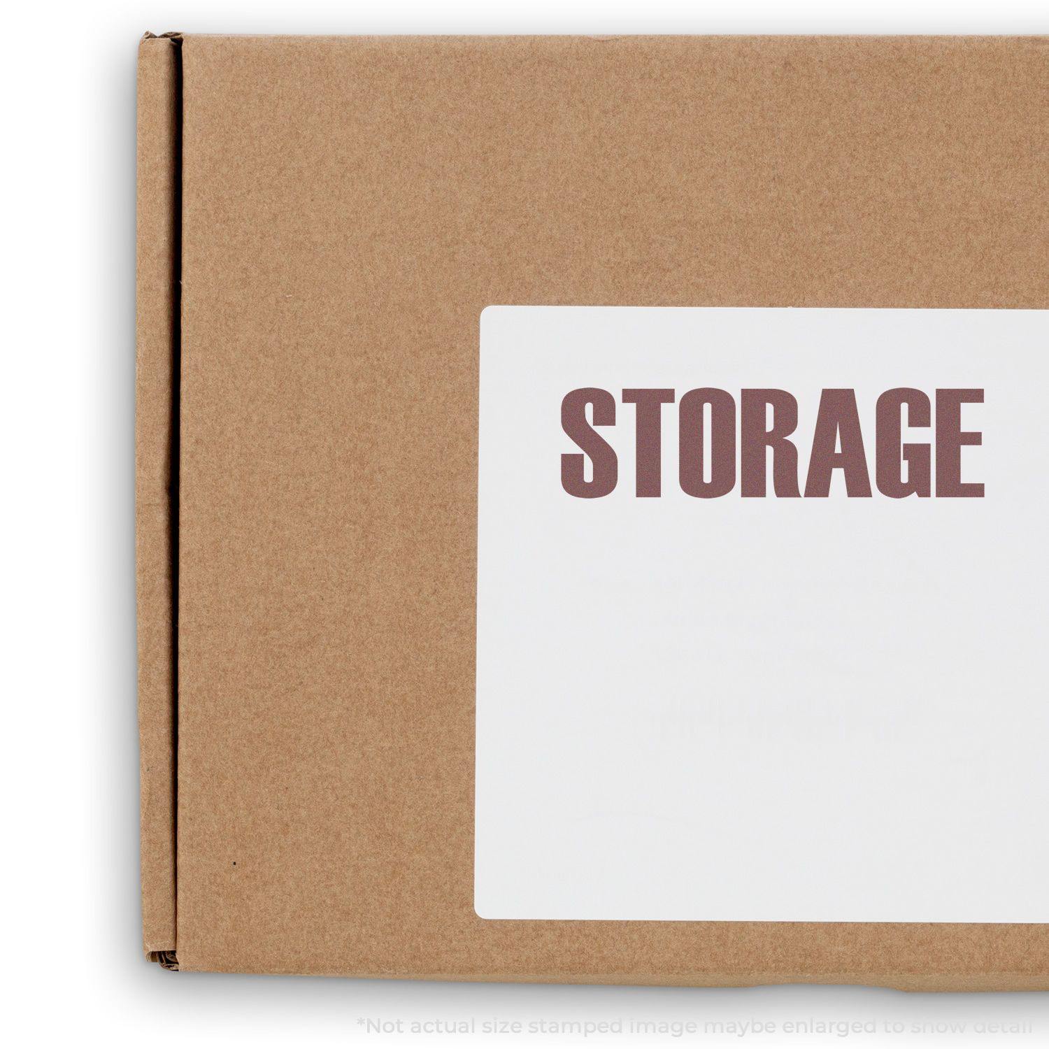 Cardboard box stamped with STORAGE using the Large Pre-Inked Storage Stamp, showcasing clear and bold text on a white label.