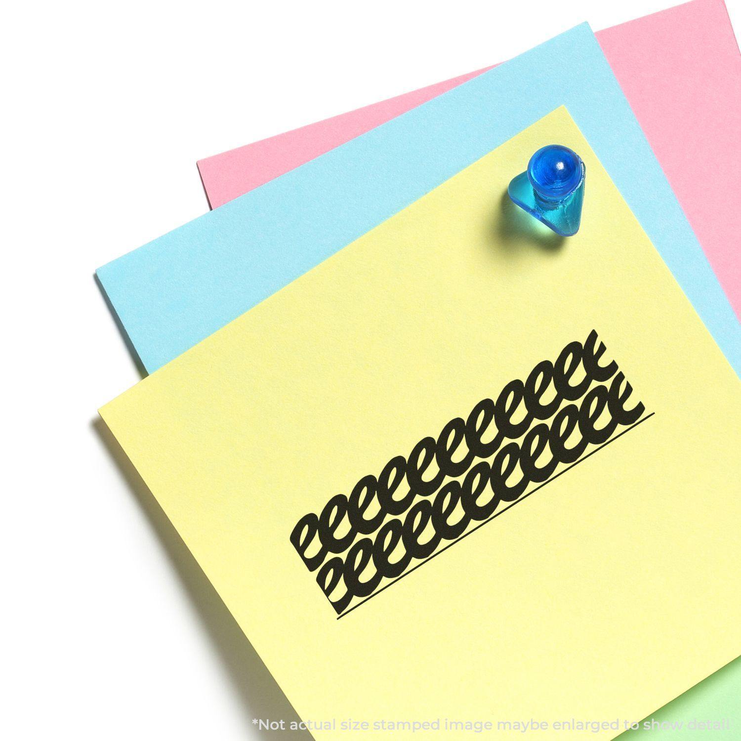 Strikeout rubber stamp marking a yellow paper, placed on top of blue and pink papers with a blue pushpin on the corner.