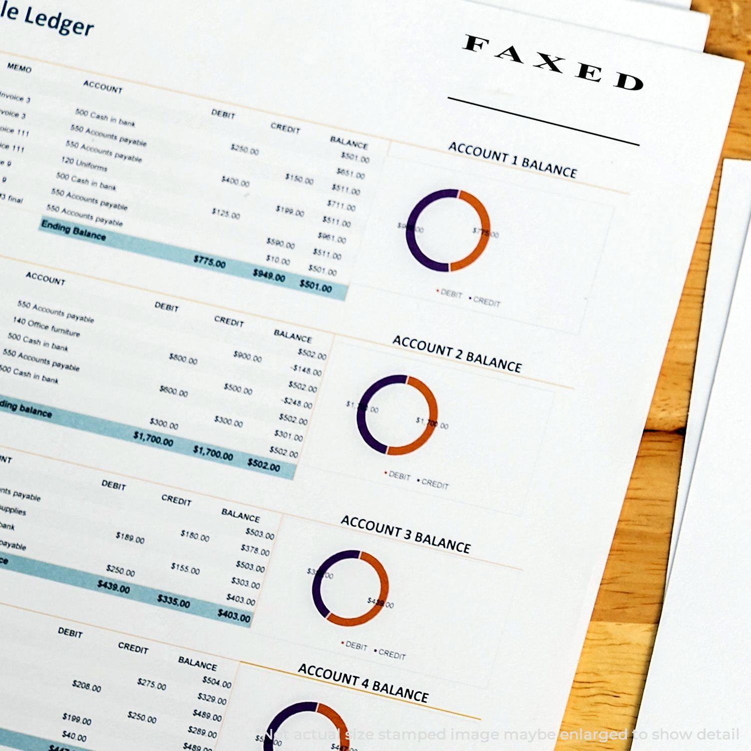 Slim Pre-Inked Faxed Stamp In Two Lines used on documents with financial charts and tables, showing FAXED in bold letters.