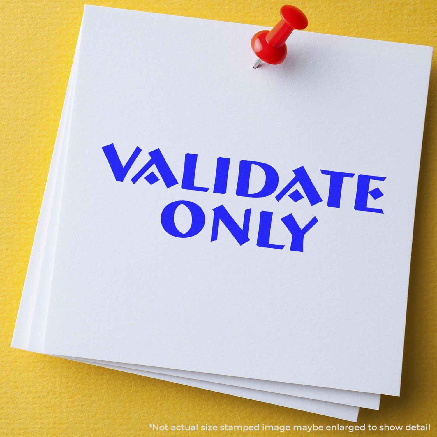 A stack of white papers with VALIDATE ONLY stamped in blue using the Self Inking Validate Only Stamp, pinned with a red pushpin.