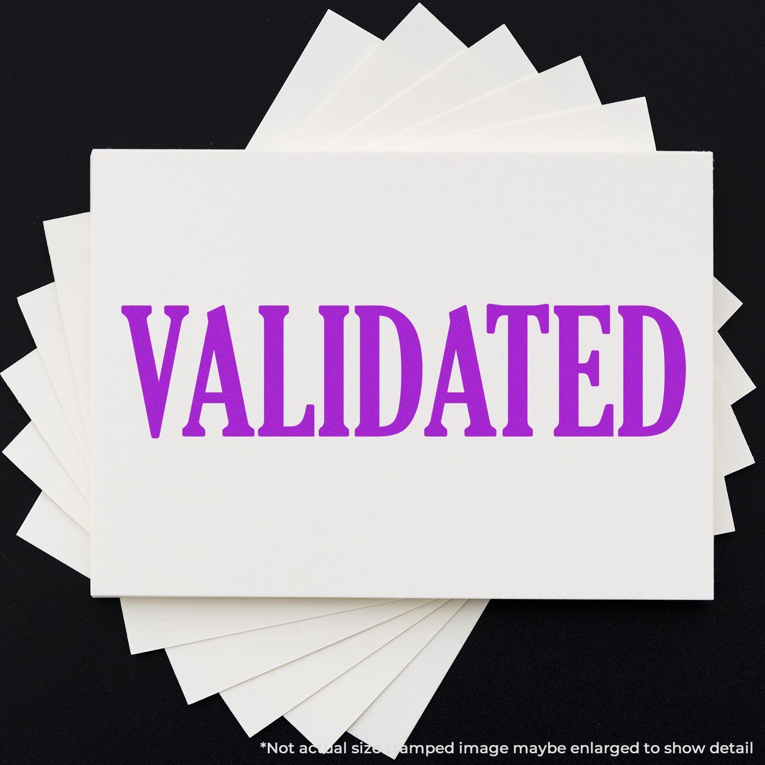 Large Pre-Inked Validated Stamp in purple ink on white paper, with multiple sheets fanned out underneath.