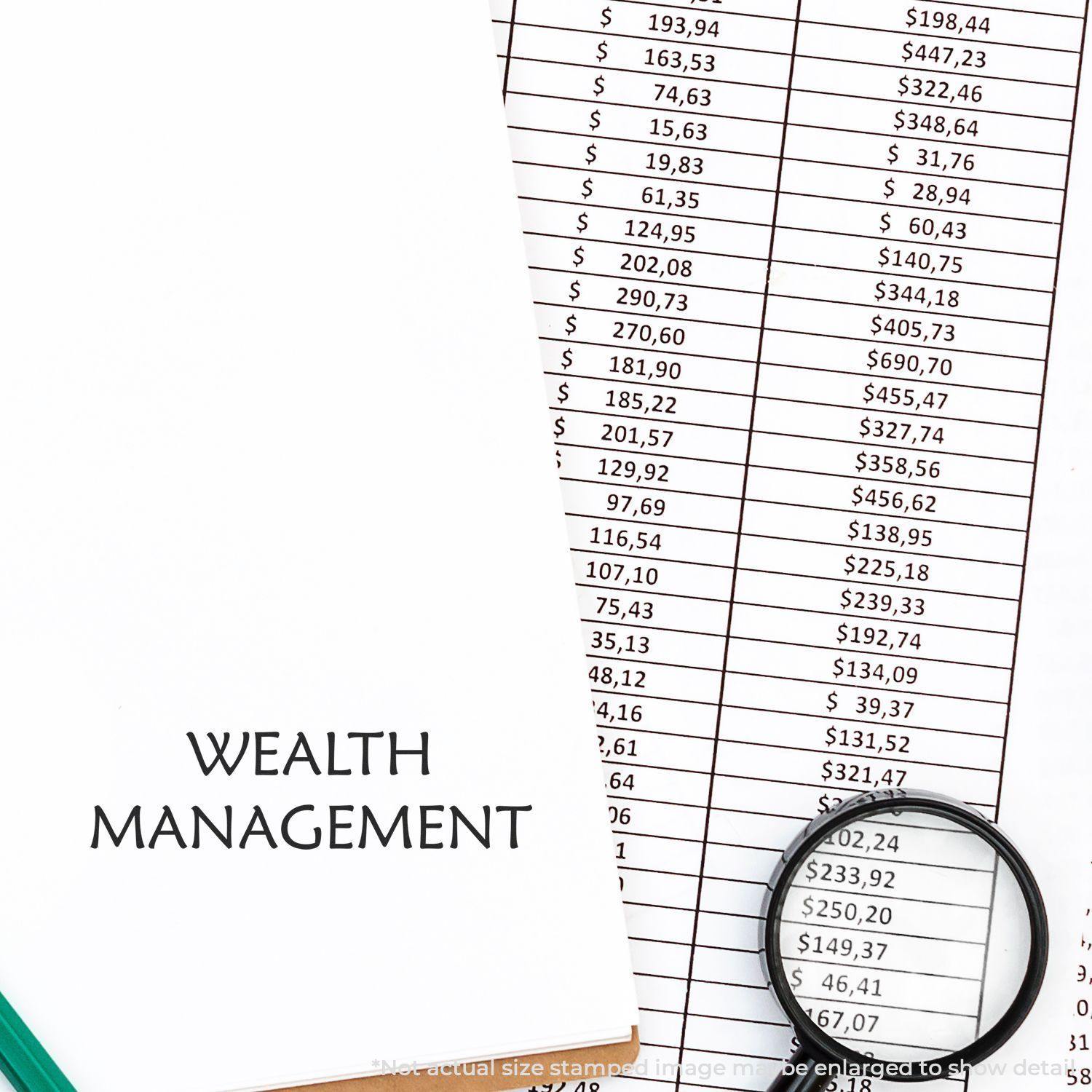 Self Inking Wealth Management Stamp used on a document with financial figures, a magnifying glass, and a pen nearby.