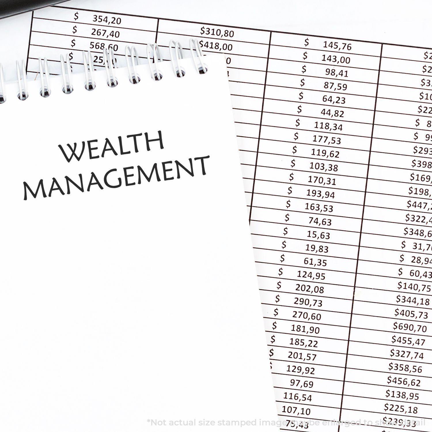 Wealth Management Rubber Stamp In Use Photo