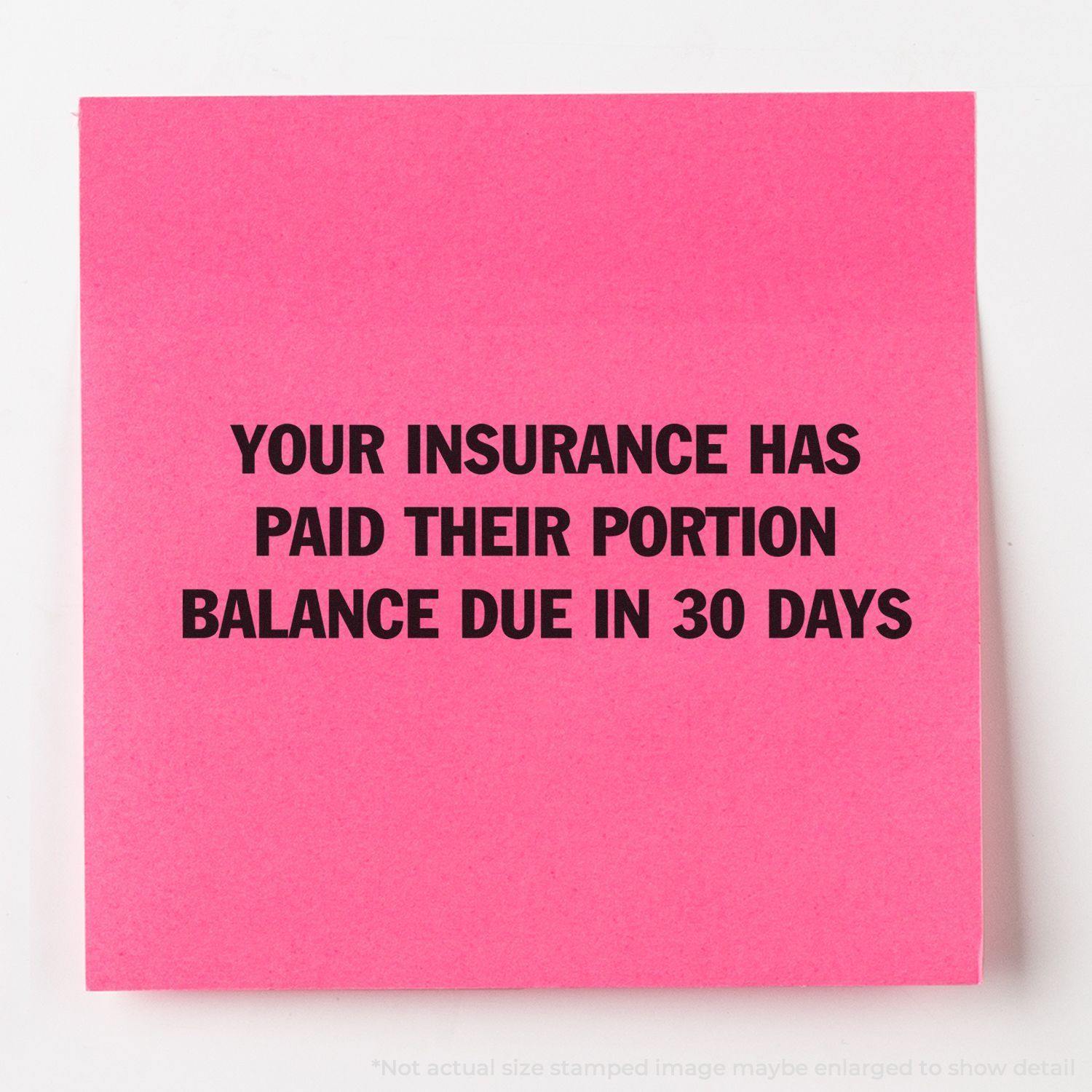 Pink paper stamped with YOUR INSURANCE HAS PAID THEIR PORTION BALANCE DUE IN 30 DAYS using the Large Pre-Inked Your Insurance Has Paid Their Portion Stamp.