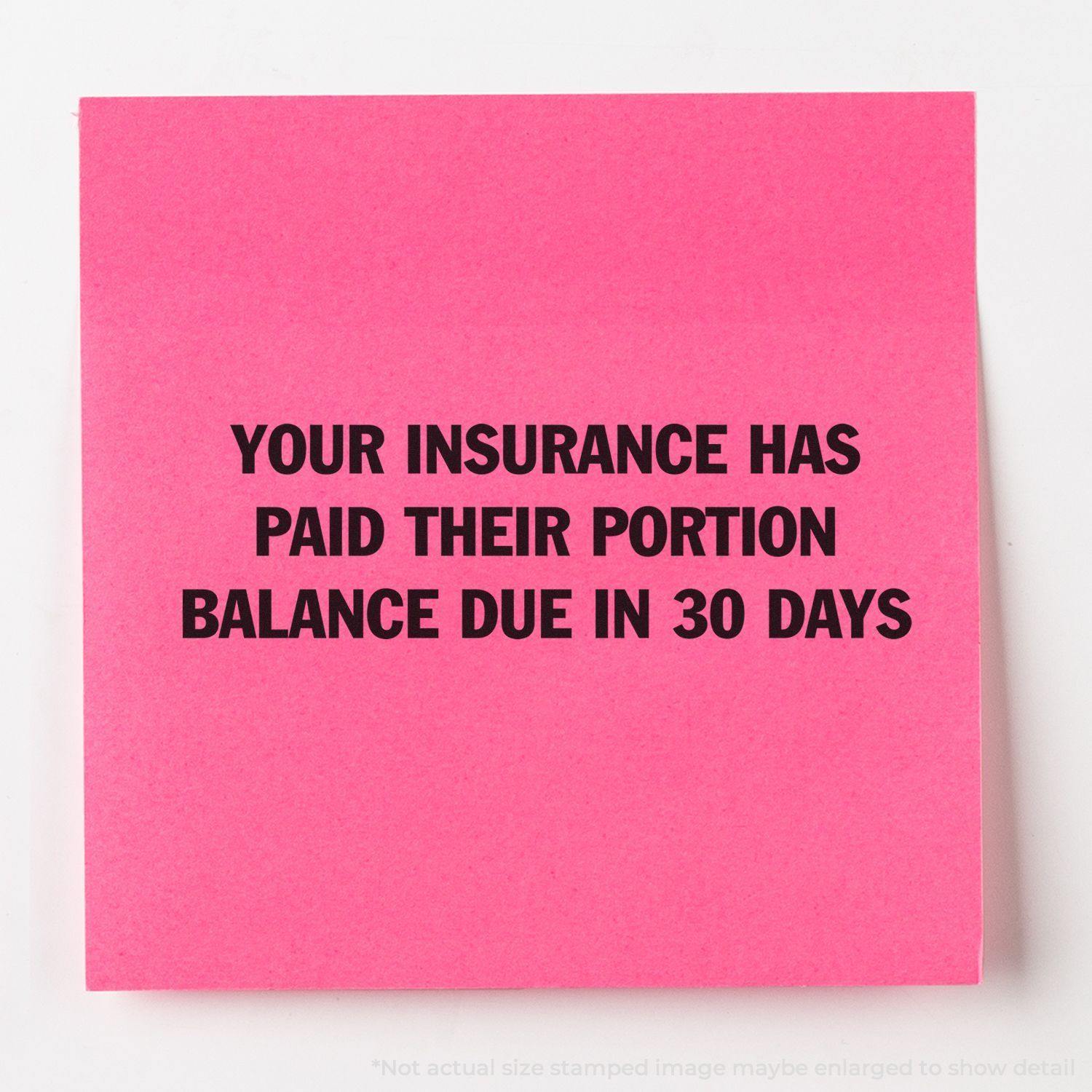 A self-inking stamp with a stamped image showing how the text "YOUR INSURANCE HAS PAID THEIR PORTION" and "BALANCE DUE IN 30 DAYS" in a large font is displayed by it after stamping.