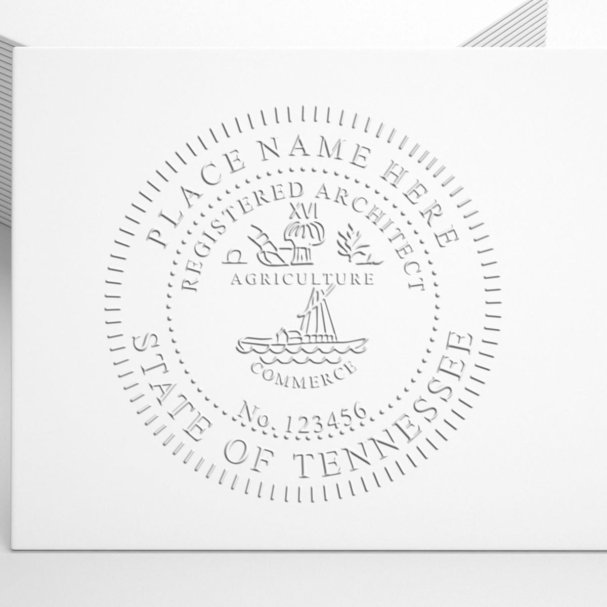A lifestyle photo showing a stamped image of the Handheld Tennessee Architect Seal Embosser on a piece of paper