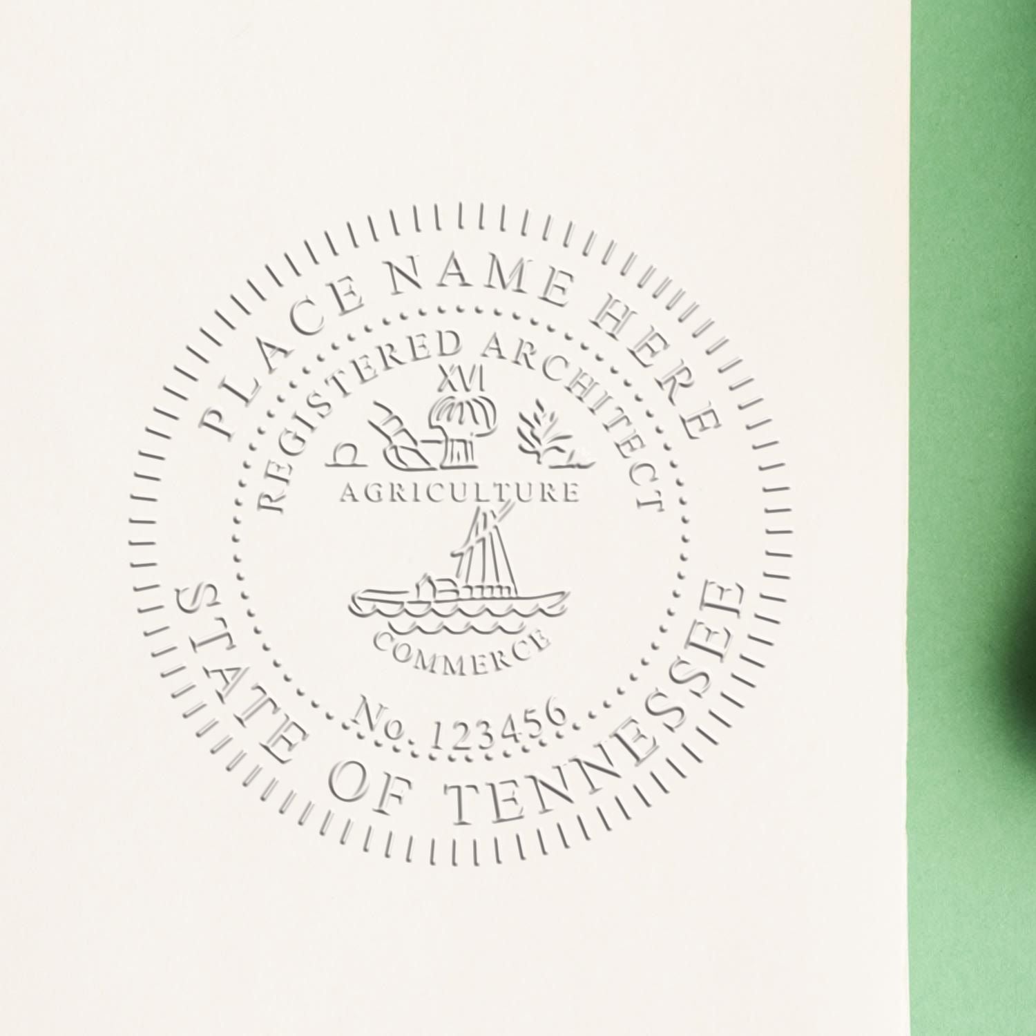 A stamped impression of the Handheld Tennessee Architect Seal Embosser in this stylish lifestyle photo, setting the tone for a unique and personalized product.