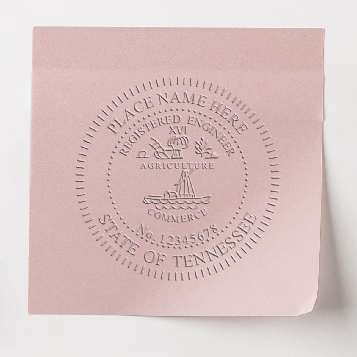 An in use photo of the Gift Tennessee Engineer Seal showing a sample imprint on a cardstock