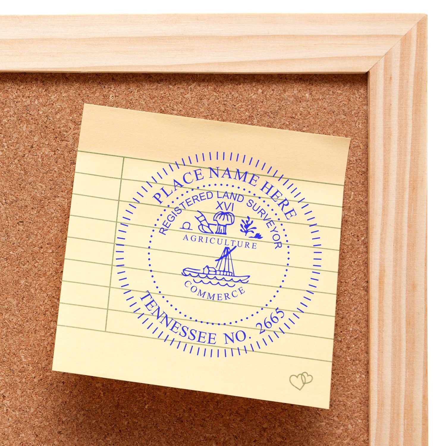 Digital Tennessee Land Surveyor Stamp on a yellow sticky note pinned to a corkboard, showcasing the electronic seal for Tennessee Land Surveyor.