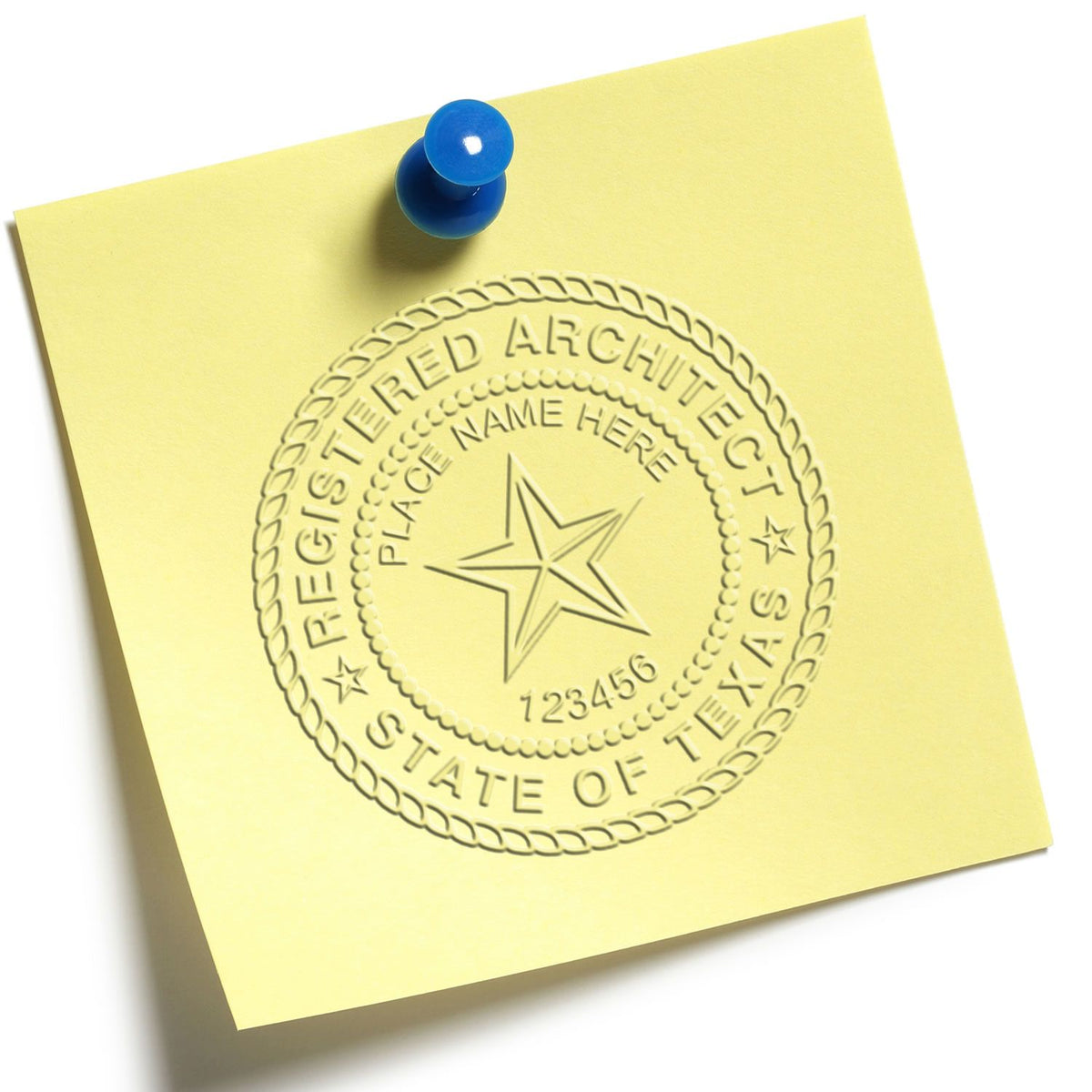 A lifestyle photo showing a stamped image of the Extended Long Reach Texas Architect Seal Embosser on a piece of paper