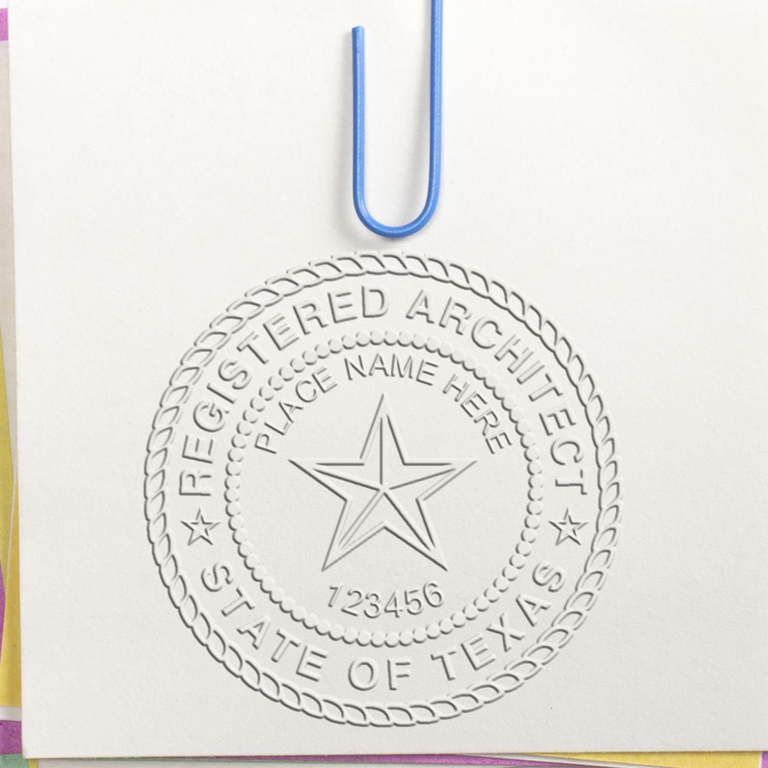 A stamped impression of the State of Texas Architectural Seal Embosser in this stylish lifestyle photo, setting the tone for a unique and personalized product.