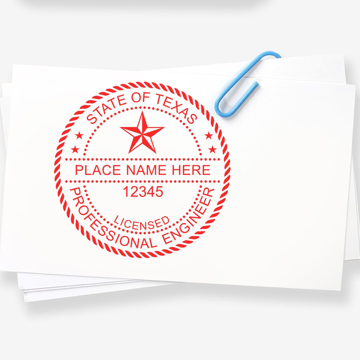 A lifestyle photo showing a stamped image of the Texas Professional Engineer Seal Stamp on a piece of paper
