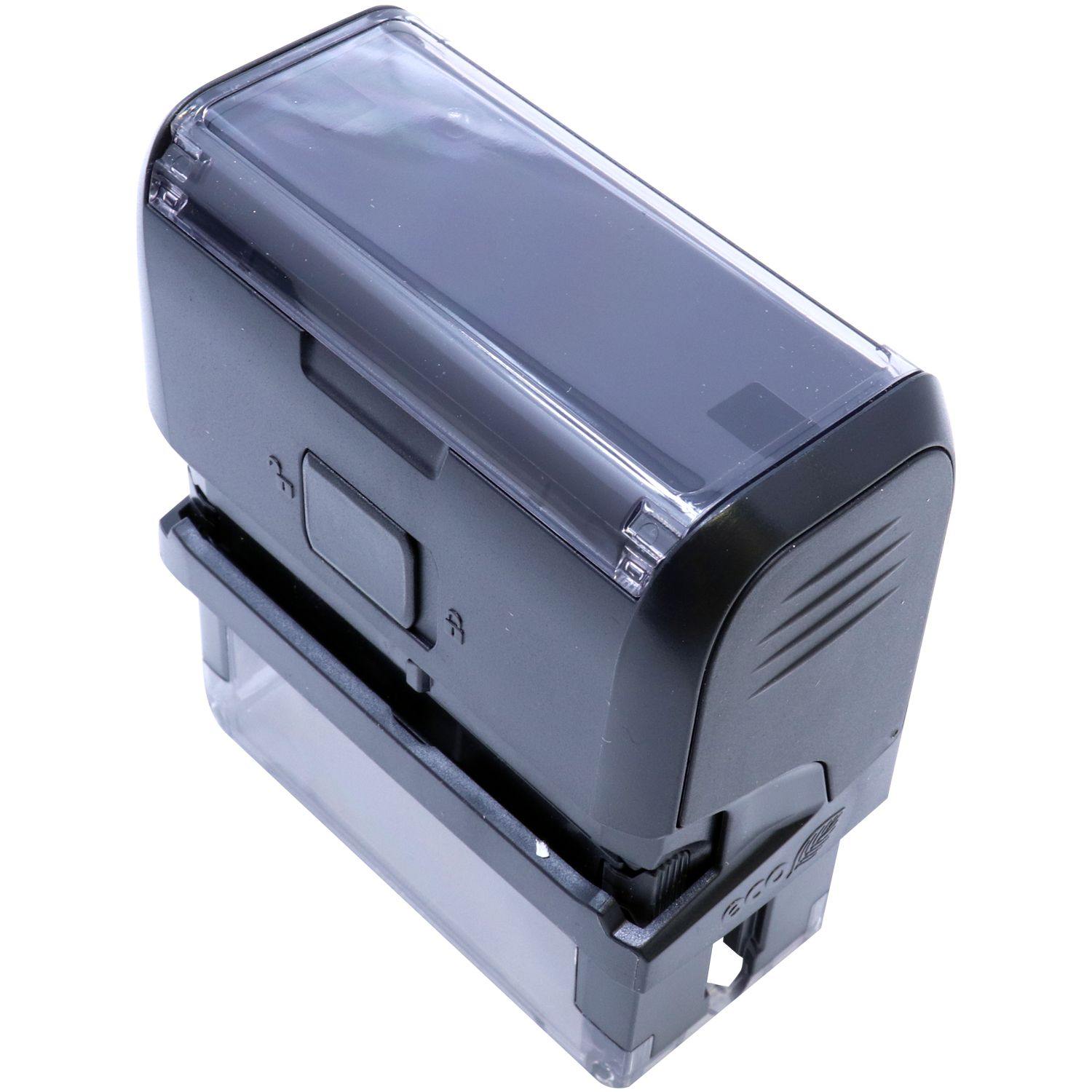 Self Inking Superceded Stamp, black and transparent, angled side-back view, with a rectangular design and a clear base for stamping.