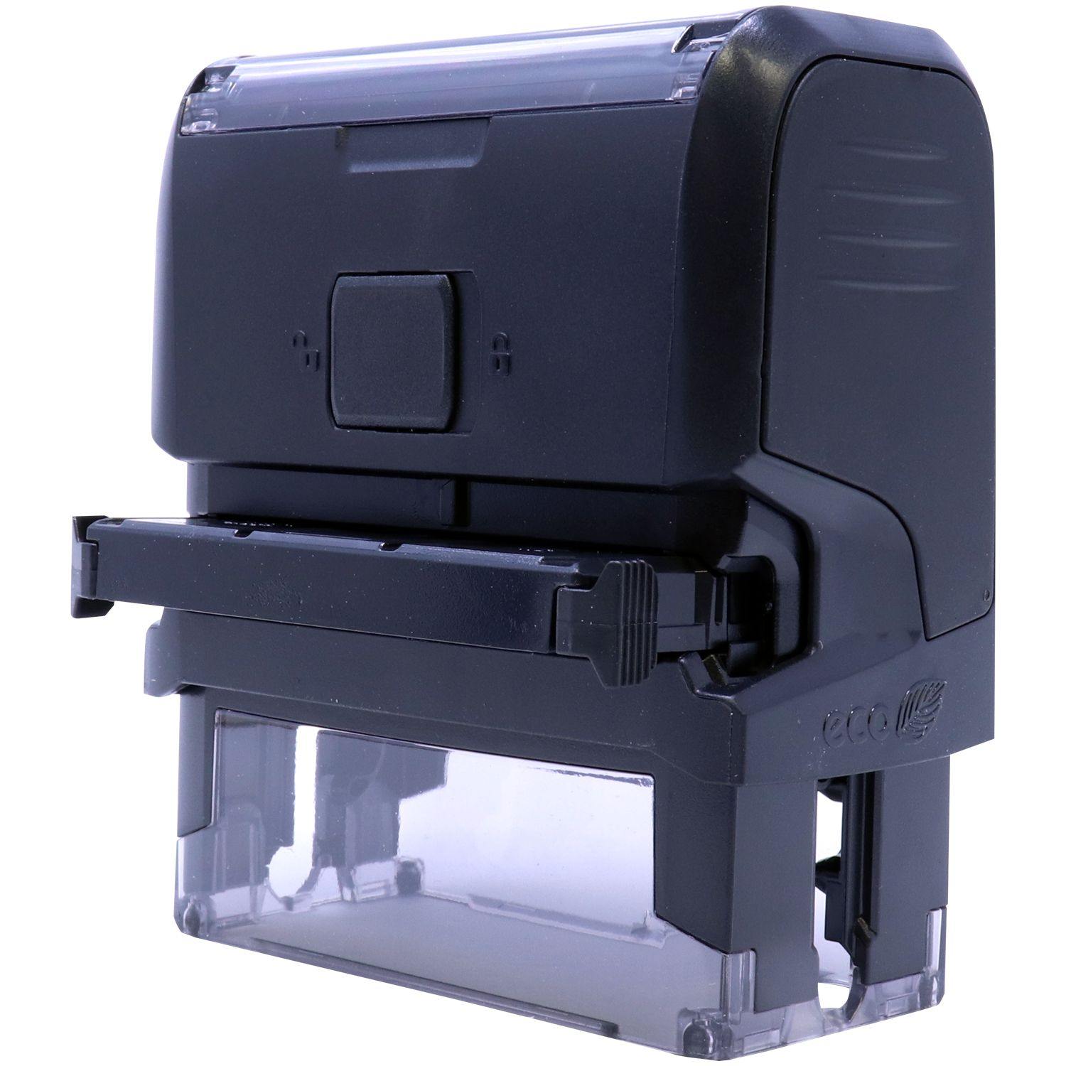 Self Inking Progress Print Stamp, black casing, with a clear base and removable ink pad, shown from the back view.