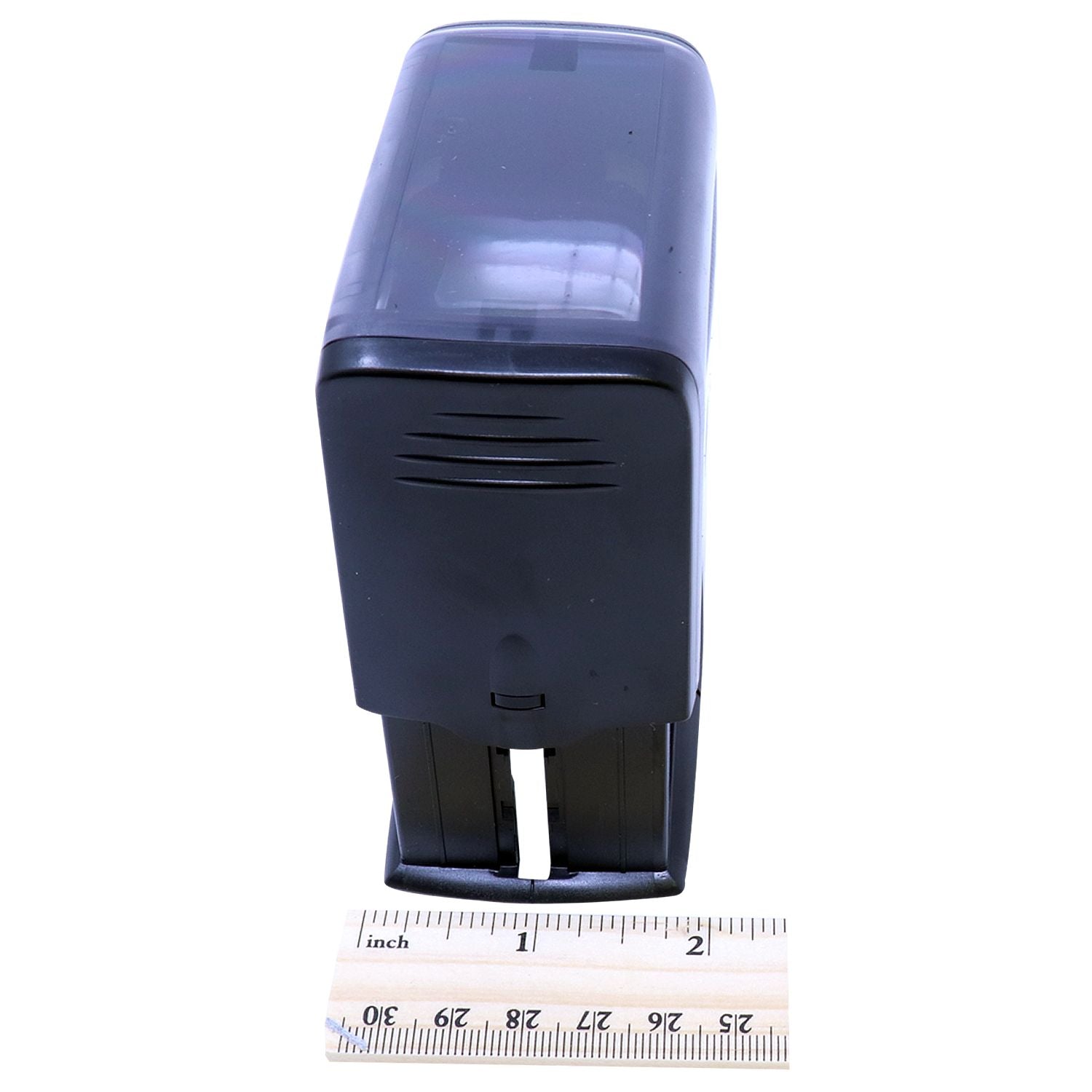 Custom Self Inking Stamp Trodat 4931 Size 1-1/8 x 2-3/4, black, angled side view with a ruler showing measurements in inches.