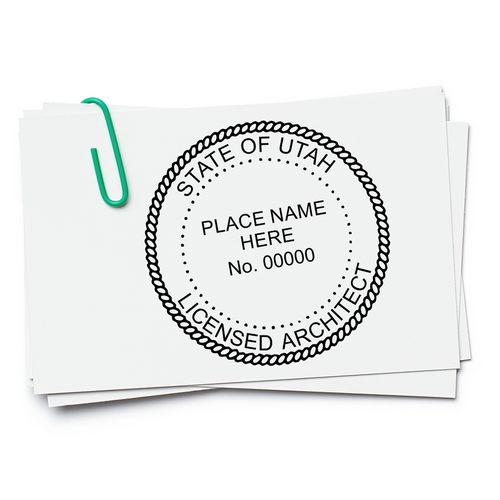 A stack of white cards with a Utah Architect Seal Stamp design, featuring State of Utah Licensed Architect text and a placeholder for name and number.