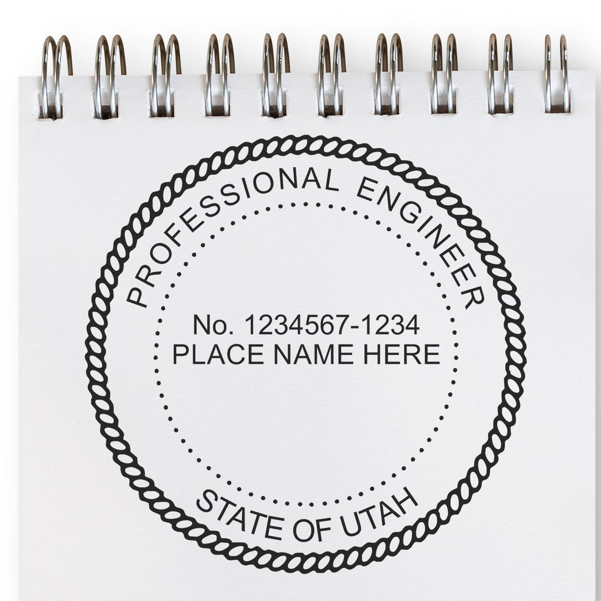 A lifestyle photo showing a stamped image of the Digital Utah PE Stamp and Electronic Seal for Utah Engineer on a piece of paper