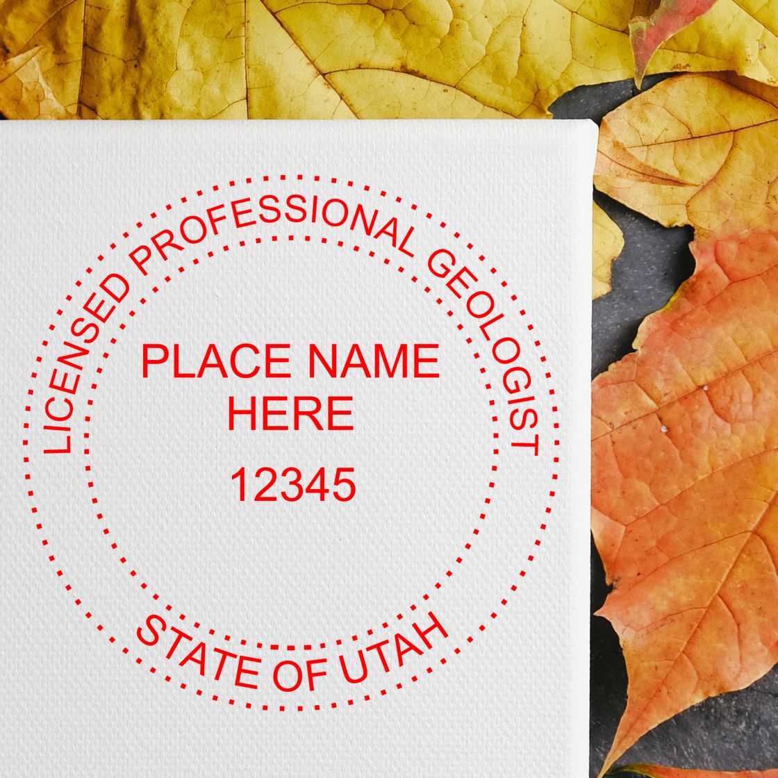 A stamped imprint of the Slim Pre-Inked Utah Professional Geologist Seal Stamp in this stylish lifestyle photo, setting the tone for a unique and personalized product.