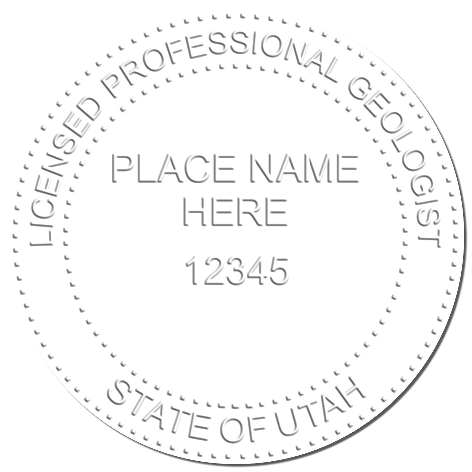 An in use photo of the Heavy Duty Cast Iron Utah Geologist Seal Embosser showing a sample imprint on a cardstock