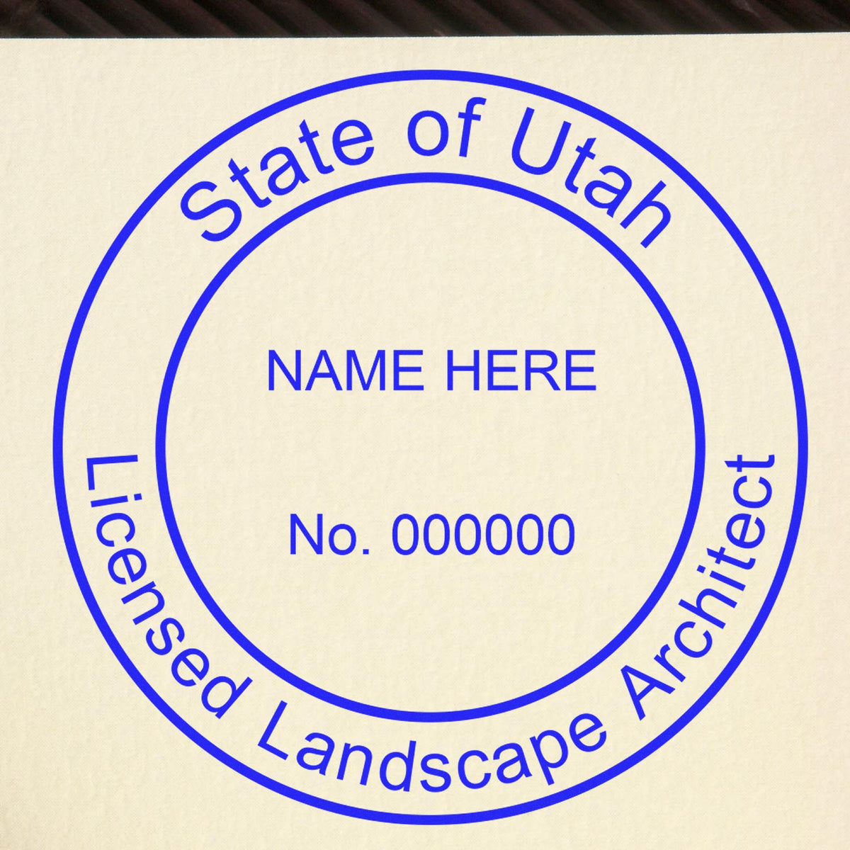 This paper is stamped with a sample imprint of the Self-Inking Utah Landscape Architect Stamp, signifying its quality and reliability.
